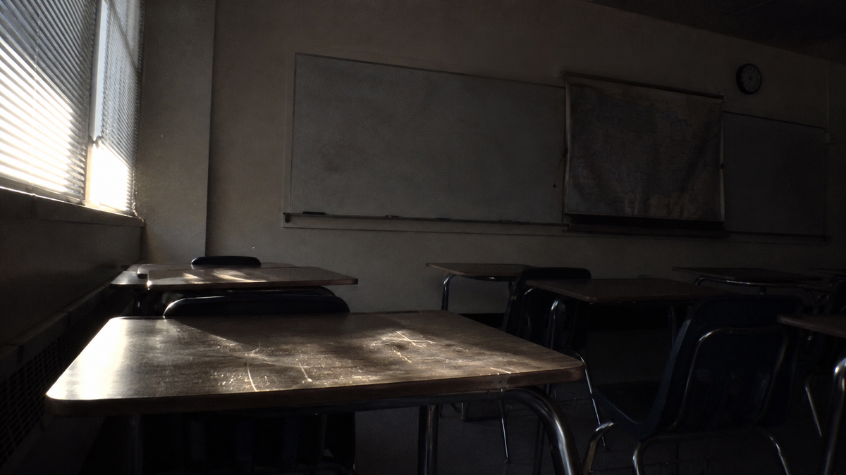 An empty American classroom late in the afternoon