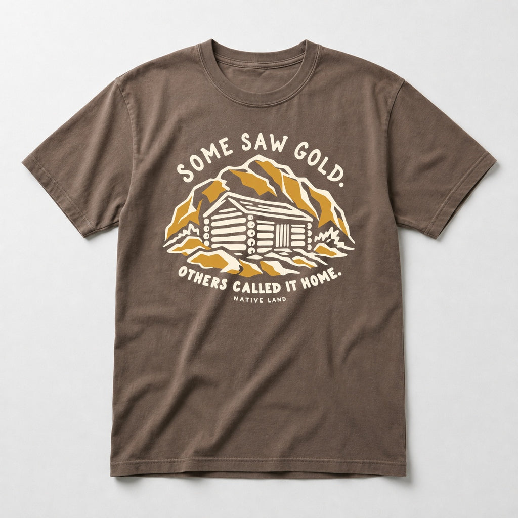 A1 Native Land heritage tee, Espresso, front print — SOME SAW GOLD. OTHERS CALLED IT HOME.