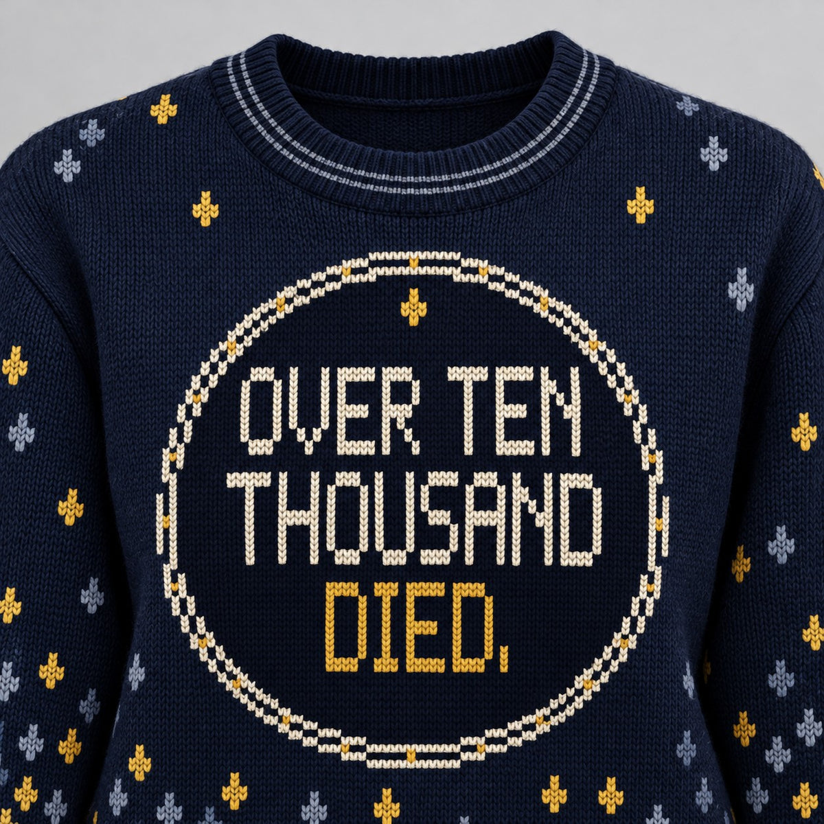 Close-up of the knitted front of the Over Ten Thousand sweater