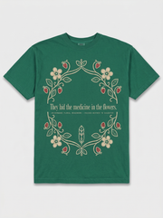 Medicine in the Flowers — emerald Anishinaabe heritage tee, full front print