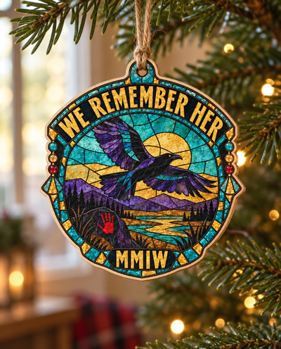 Glass Sky ornament that says We remember her