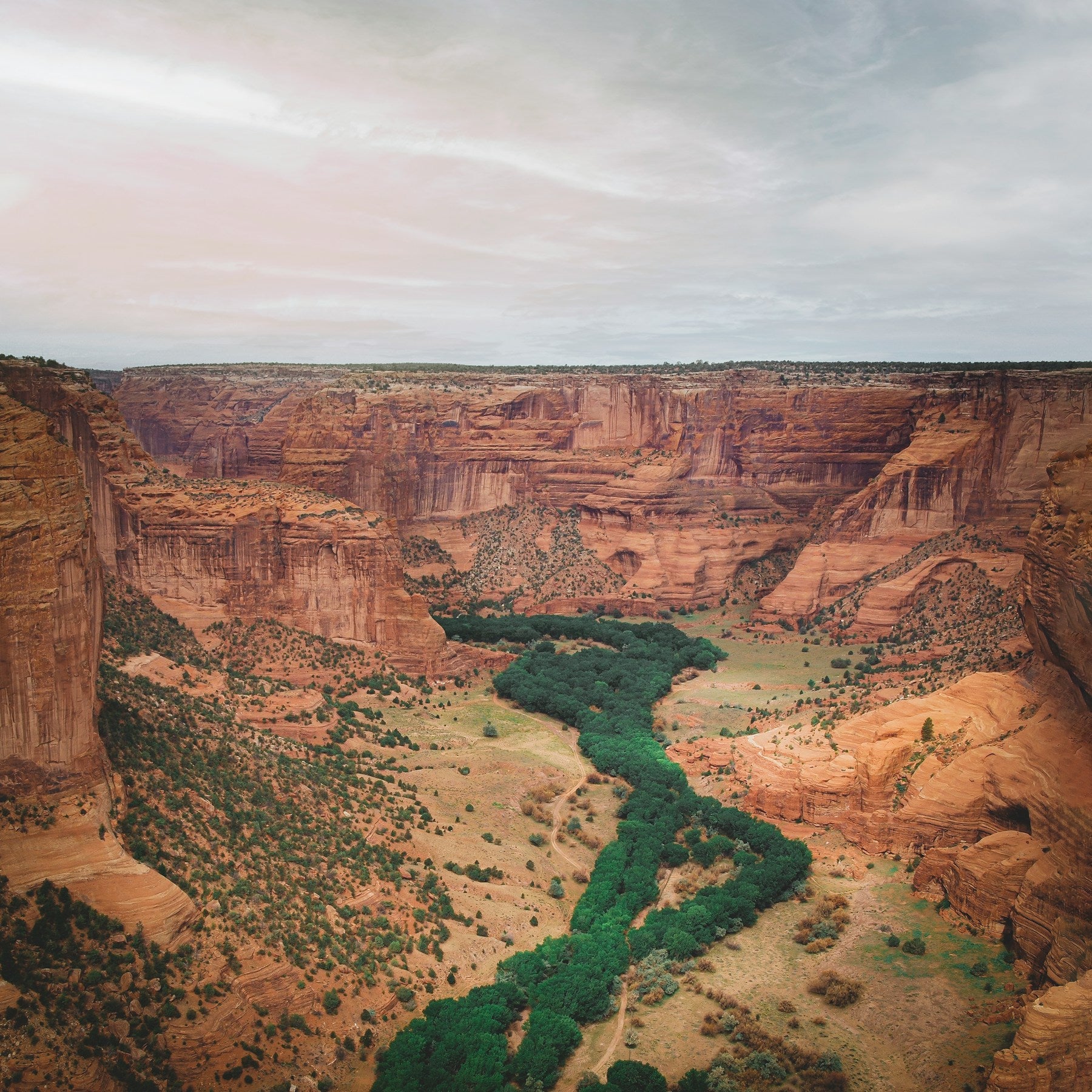Brown rock formation under clouds — Canyon de Chelly Navajo land